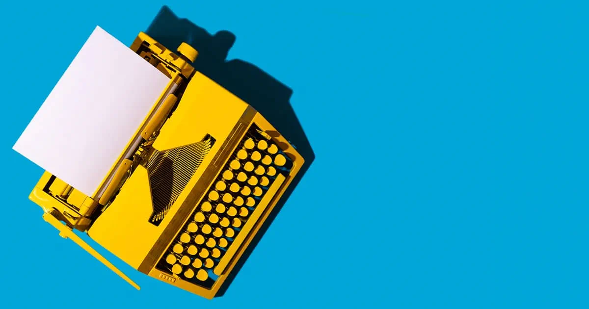 Yellow typewritter on blue background